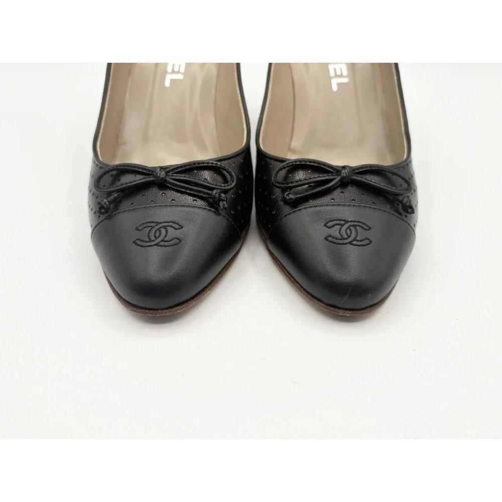 Chanel Black Perforated Leather Heels w/ CC Cap Toe & Bow Accent Size EU 36.5